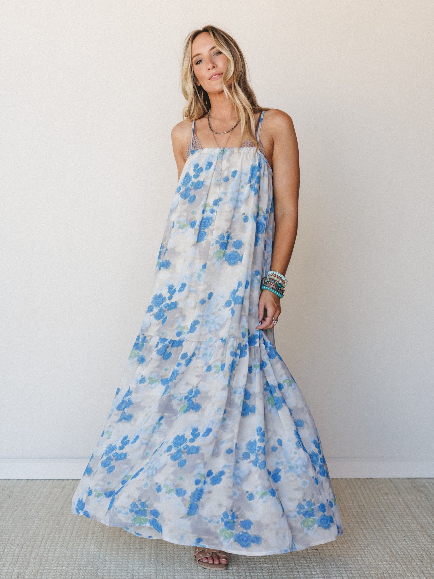 flowy floral maxi dress A flowy short flutter sleeve maxi dress in a pink floral print Days of Old Floral Maxi