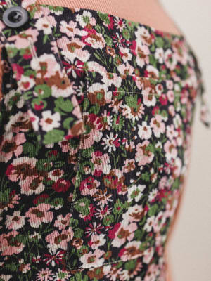 Close-up of a floral patterned fabric with a neutral background