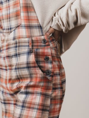 Plaid shirt with buttons on a neutral background