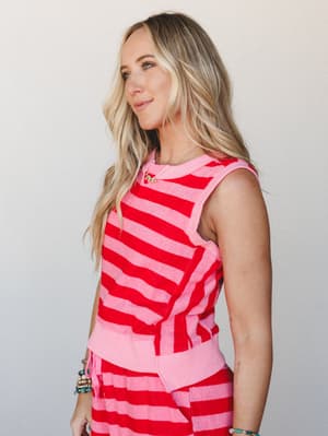 A bright, cheerful matching set in bold pink and red stripes — the kind of outfit that makes you reach for it on a Saturday morning without overthinking it.