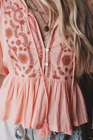 louella-embroidered-peplum-top-coral/Orange
