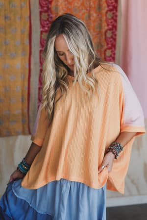 the-nest-wild-at-heart-contrast-top-blush-apricot/Orange