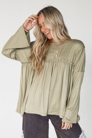 The Nest Solid Serenity Long Sleeve Babydoll Top in Olive from Three Bird Nest