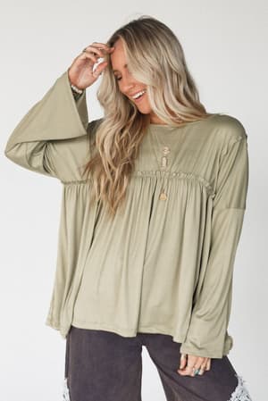 The Nest Solid Serenity Long Sleeve Babydoll Top in Olive from Three Bird Nest