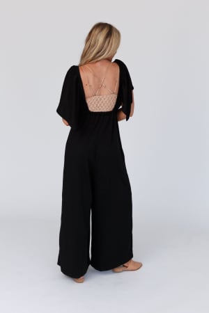 on-repeat-open-back-ruffle-jumpsuit-black/Black