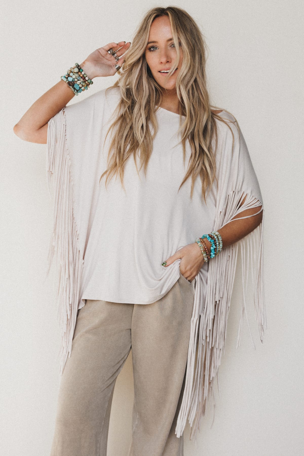 Shop Showstopper Fringe Top >